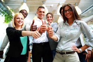 happy-business-group-giving-thumbs-up-SBI-300855595